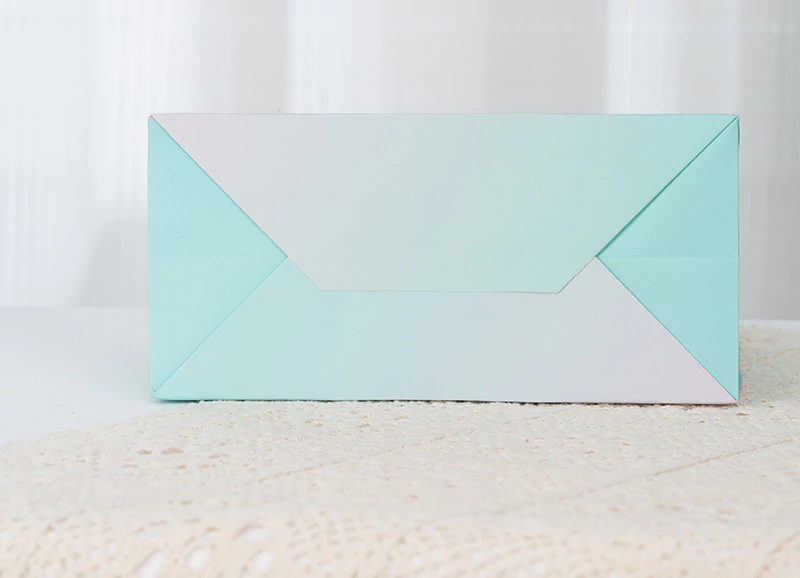 Gradient color handheld paper bag bottom