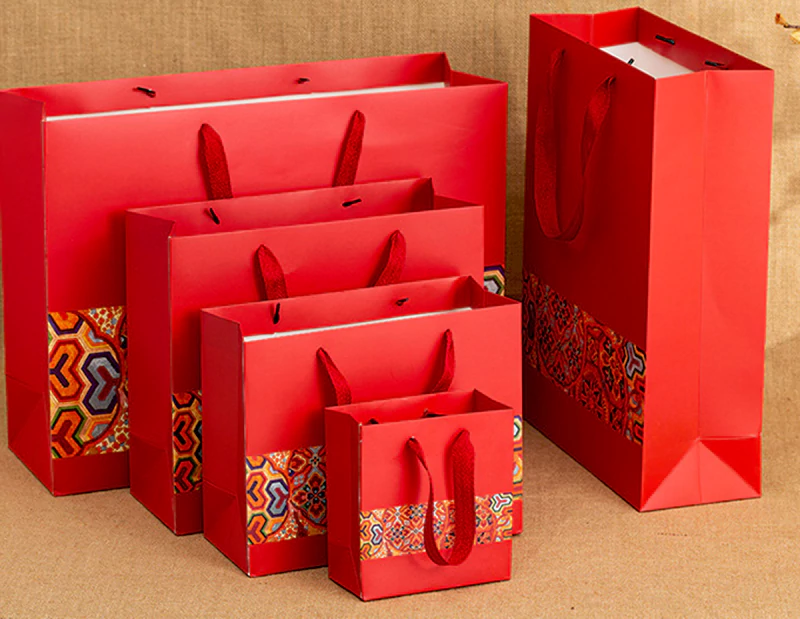 Red ethnic style handheld paper bag