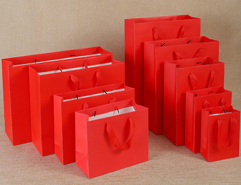 Red handheld paper bag