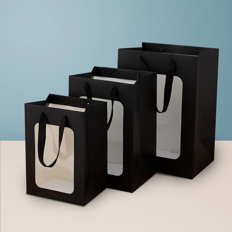 black show window handheld paper bag